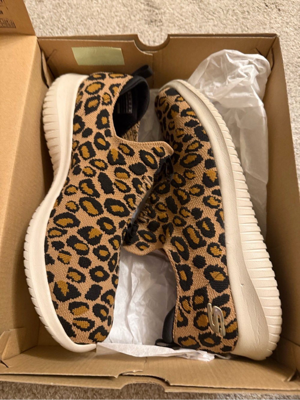 Skechers Slip-On Sneakers in Leopard Print Tan and Black
